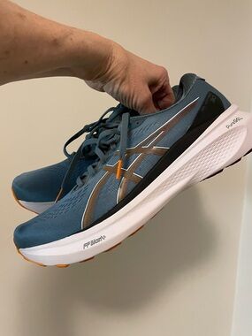 Asics Blue Running Shoes with Orange Accents